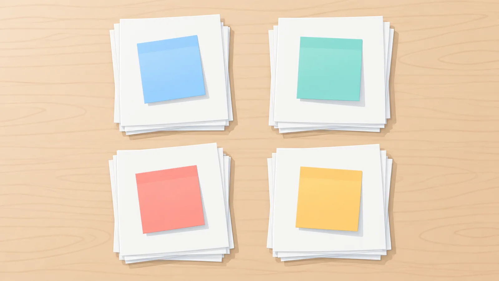 Quattro pile di fogli con note adesive di colori diversi